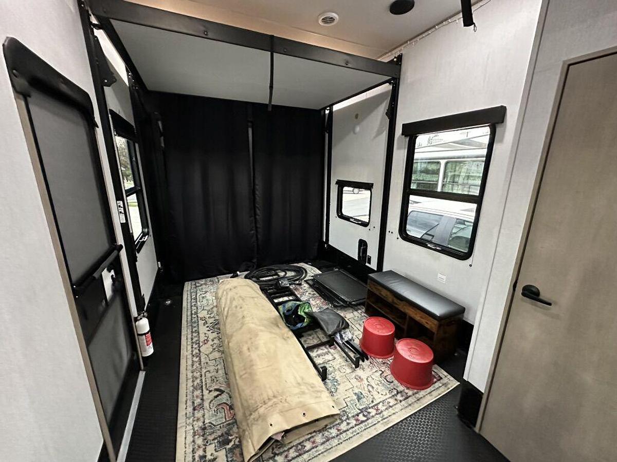 Used 2023 Grand Design Momentum M-395MS Fifth Wheel Toy Hauler