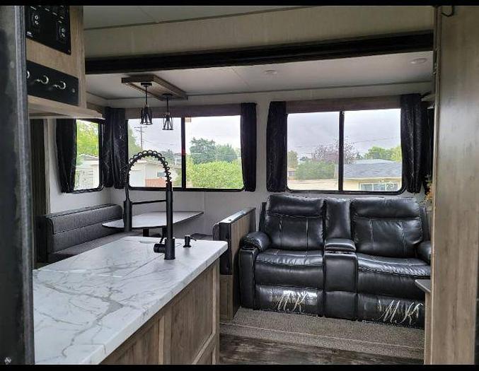 Used 2022 Forest River Cherokee Wolf Pack 315PACK12 and 2019 KTM 250 XC-W