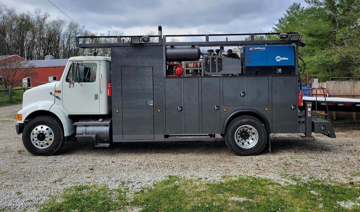 Used 1999 International 8100 with 2011 Auto Crane 10006H