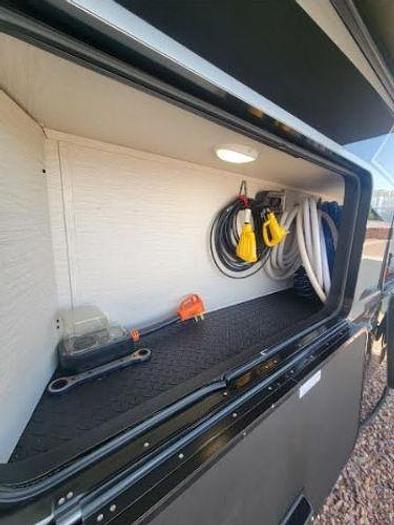 Used 2022 Forest River Riverstone Legacy Fifth Wheel Toy Hauler