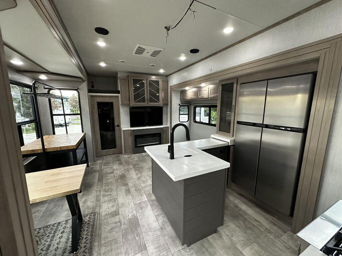 Used 2023 Grand Design Momentum M-395MS Fifth Wheel Toy Hauler