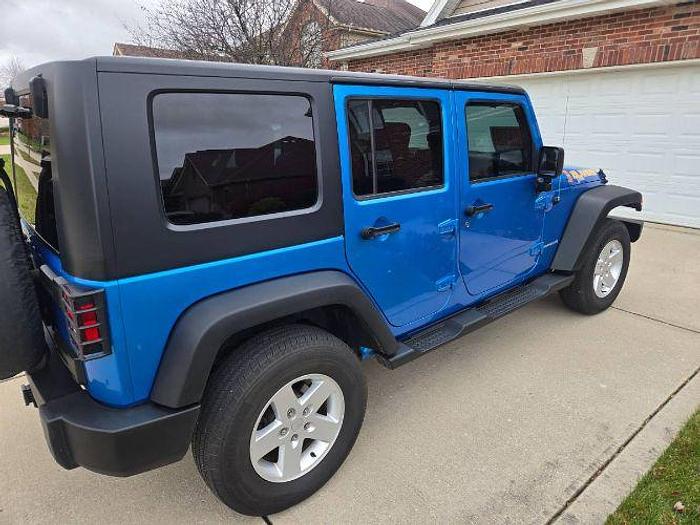 Used 2010 Jeep Wrangler Unlimited Sport Islander Edition