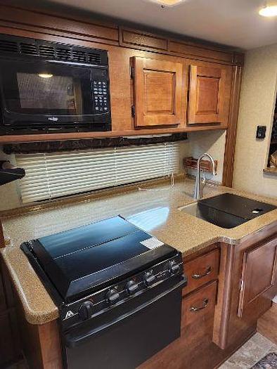 Used 2015 Lance Truck Camper Long Bed 1052