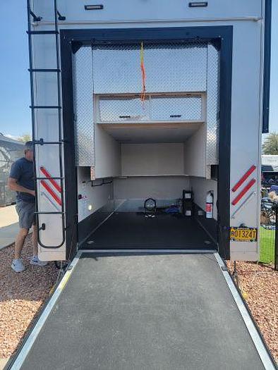 Used 2022 Forest River Riverstone Legacy Fifth Wheel Toy Hauler