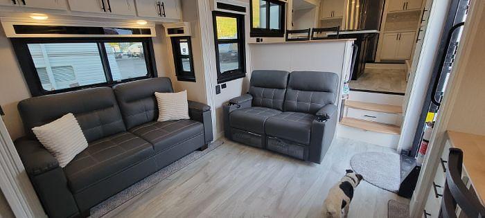 Used 2022 Forest River Riverstone Legacy Fifth Wheel Toy Hauler