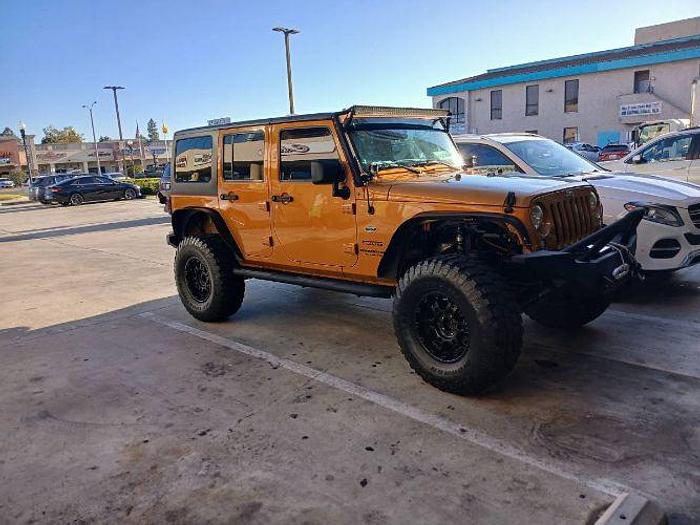 Used 2014 Jeep Wrangler Unlimited Sport