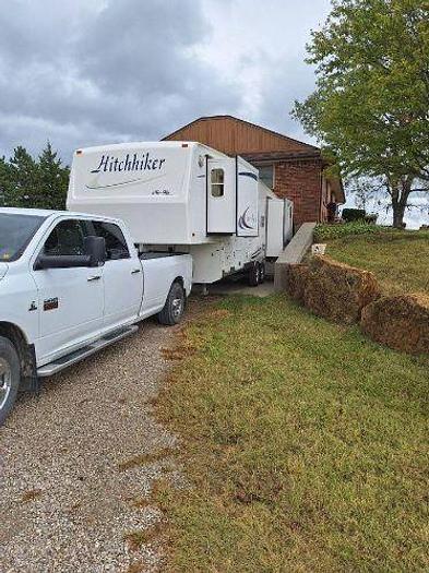 Used 2012 RAM 2500 and 2003 NuWa Hitchhiker Discover America