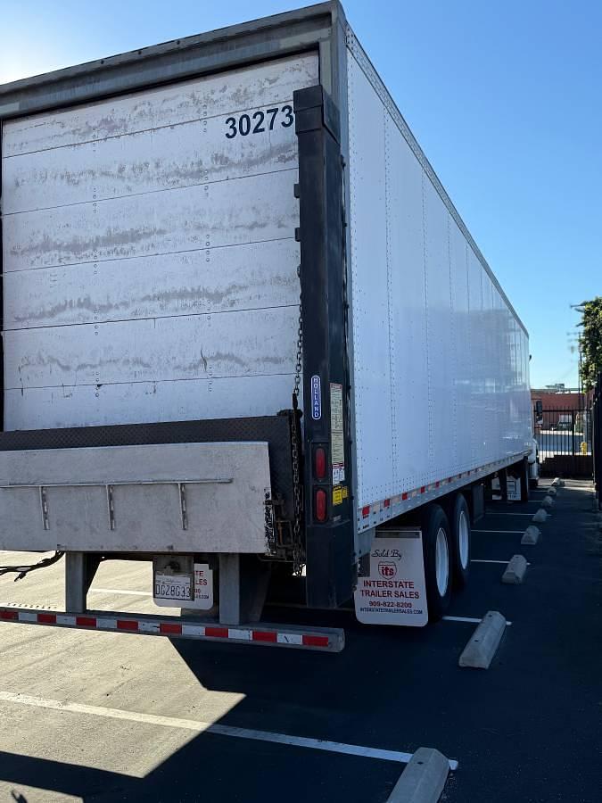 Used 2014 Freightliner M2 112 and 2010 Vanguard 48x102 4500# Holland with ETrac Trailer