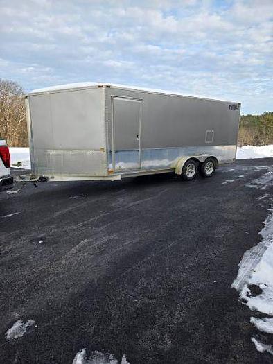 Used 2005 and 2003 Polaris Snowmobiles with a Thule Snopro Three Place Trailer