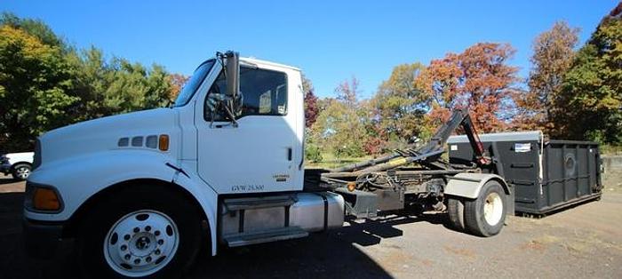 Used 2006 Sterling Acterra with Three Dumpster Bodies