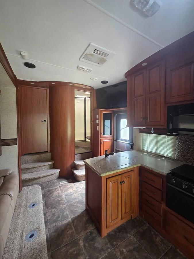 Used 2013 Heartland Cyclone Toy Hauler Fifth Wheel