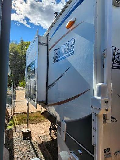Used 2015 Lance Truck Camper Long Bed 1052