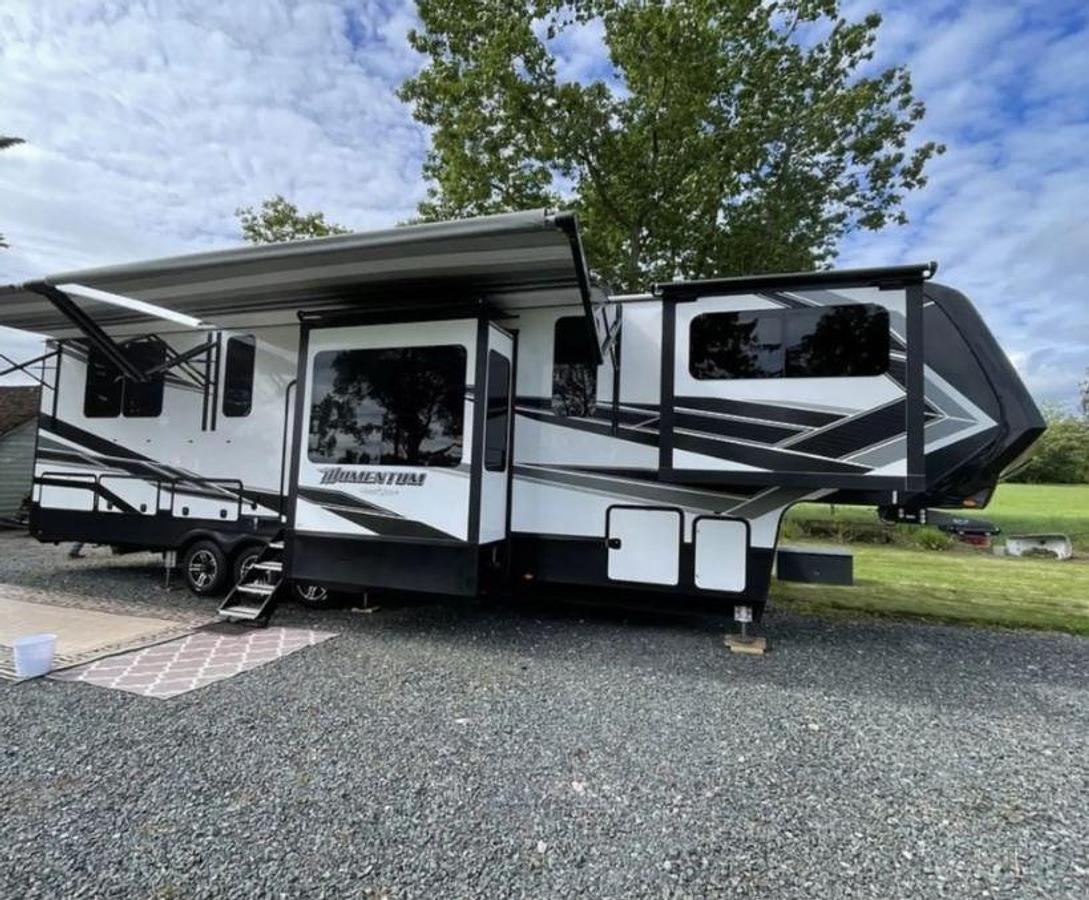 Used 2021 Grand Design MOMENTUM 376THS Fifth Wheel