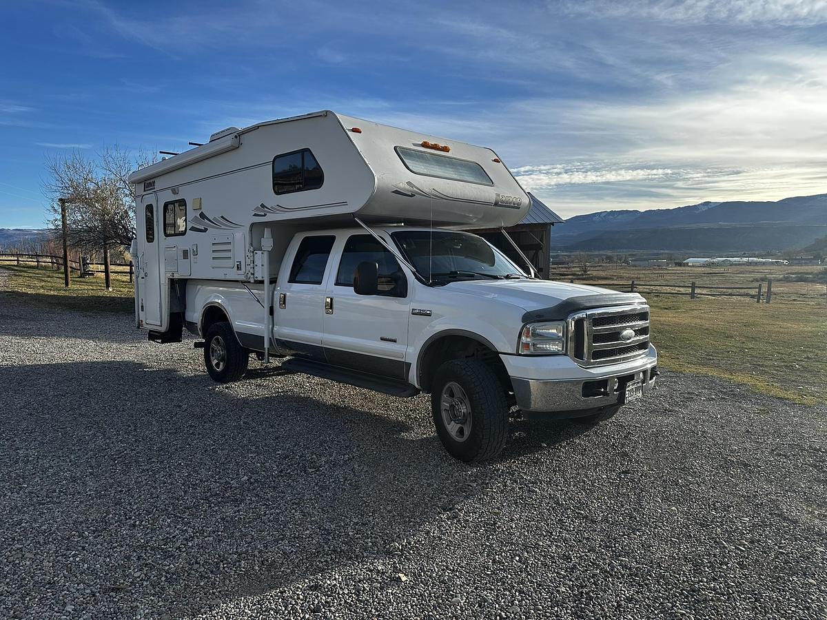 Used 2004 Lance 1161 Cab Over Camper Mounted on a 2005 Ford F350 Lariat