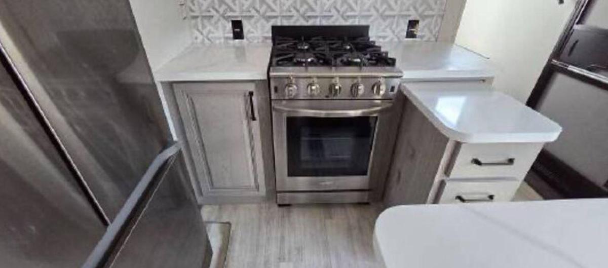 Used 2024 Keystone Alpine 3303CK Fifth Wheel