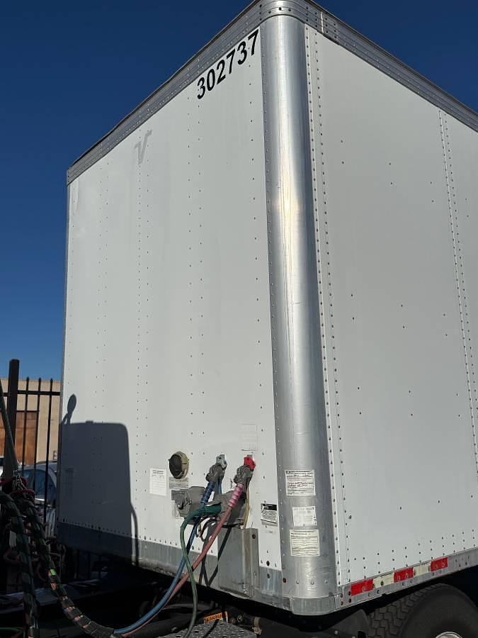 Used 2014 Freightliner M2 112 and 2010 Vanguard 48x102 4500# Holland with ETrac Trailer