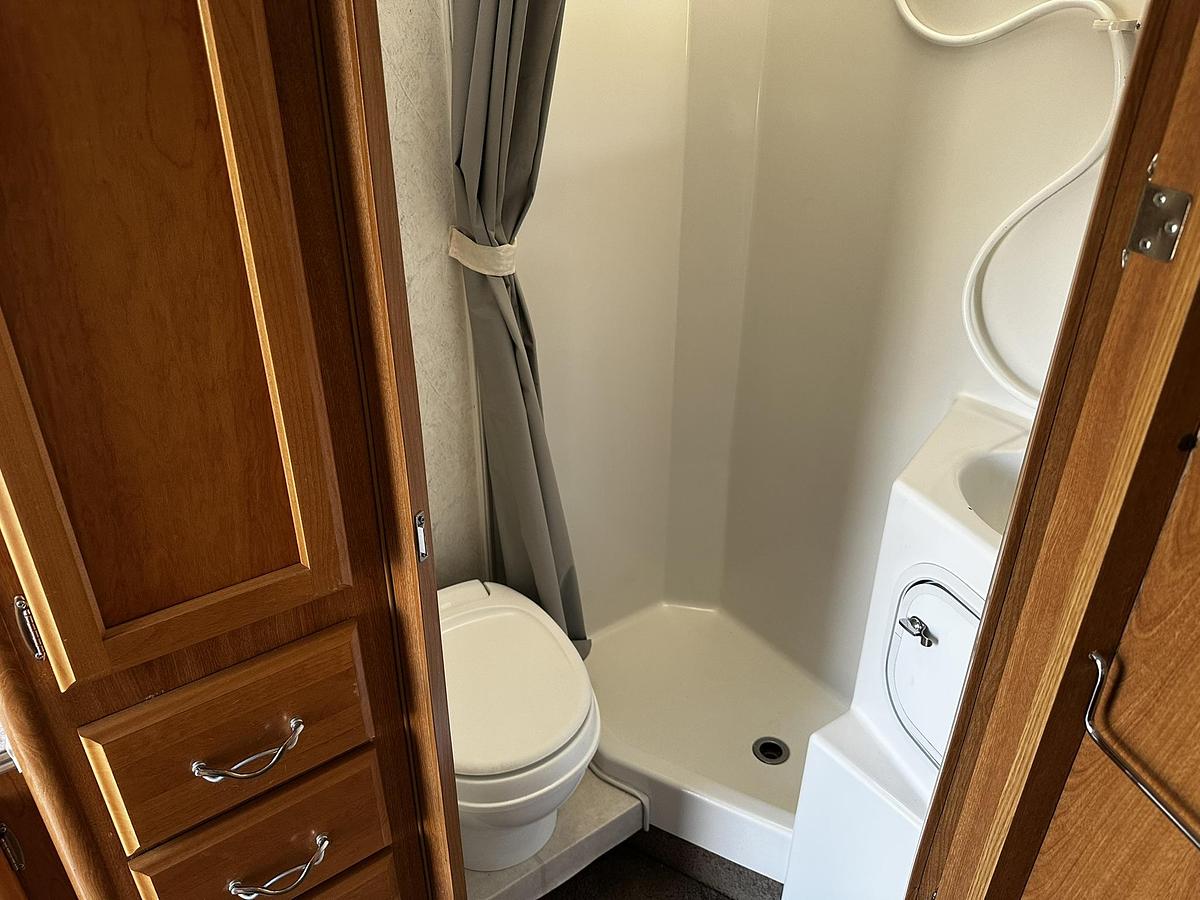 Used 2004 Lance 1161 Cab Over Camper Mounted on a 2005 Ford F350 Lariat