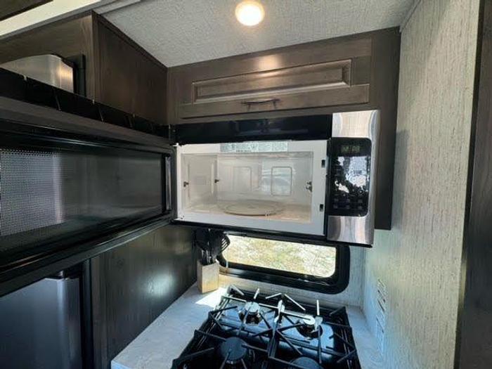 Used 2021 Grand Design Momentum M-Class 381M