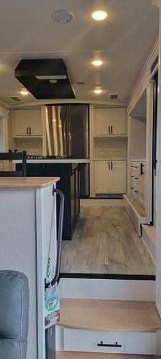 Used 2022 Forest River Riverstone Legacy Fifth Wheel Toy Hauler