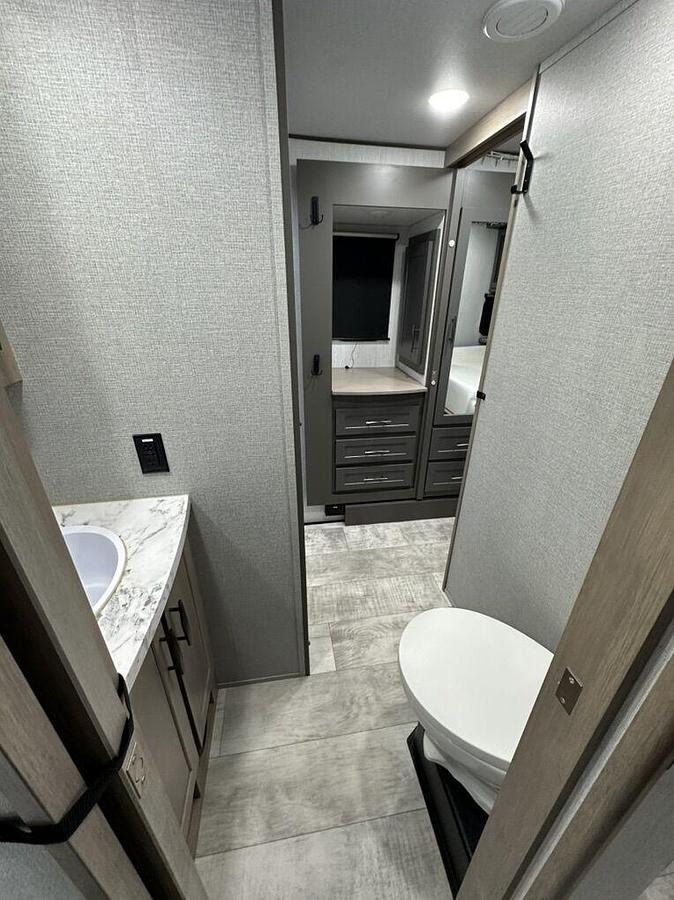 Used 2023 Grand Design Momentum M-395MS Fifth Wheel Toy Hauler