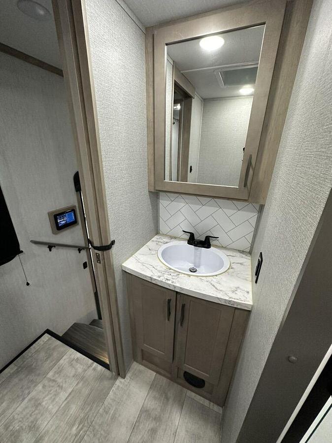 Used 2023 Grand Design Momentum M-395MS Fifth Wheel Toy Hauler