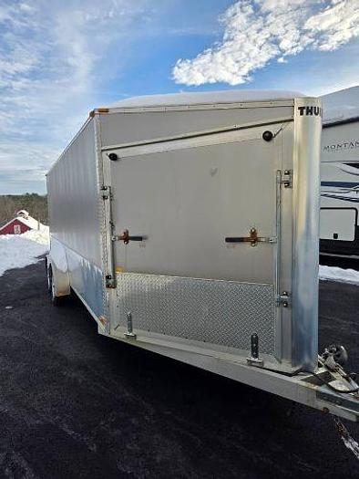 Used 2005 and 2003 Polaris Snowmobiles with a Thule Snopro Three Place Trailer