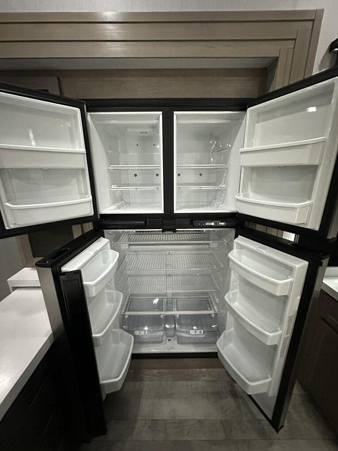 Used 2023 Grand Design Momentum M-395MS Fifth Wheel Toy Hauler