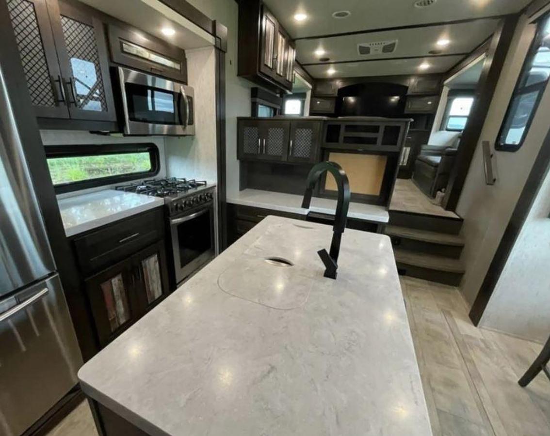 Used 2021 Grand Design MOMENTUM 376THS Fifth Wheel