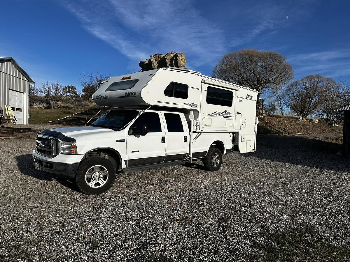 Used 2004 Lance 1161 Cab Over Camper Mounted on a 2005 Ford F350 Lariat