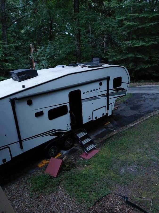 Used 2024 Keystone Cougar 2400RE Fifth Wheel and a 2024 GMC Sierra 2500