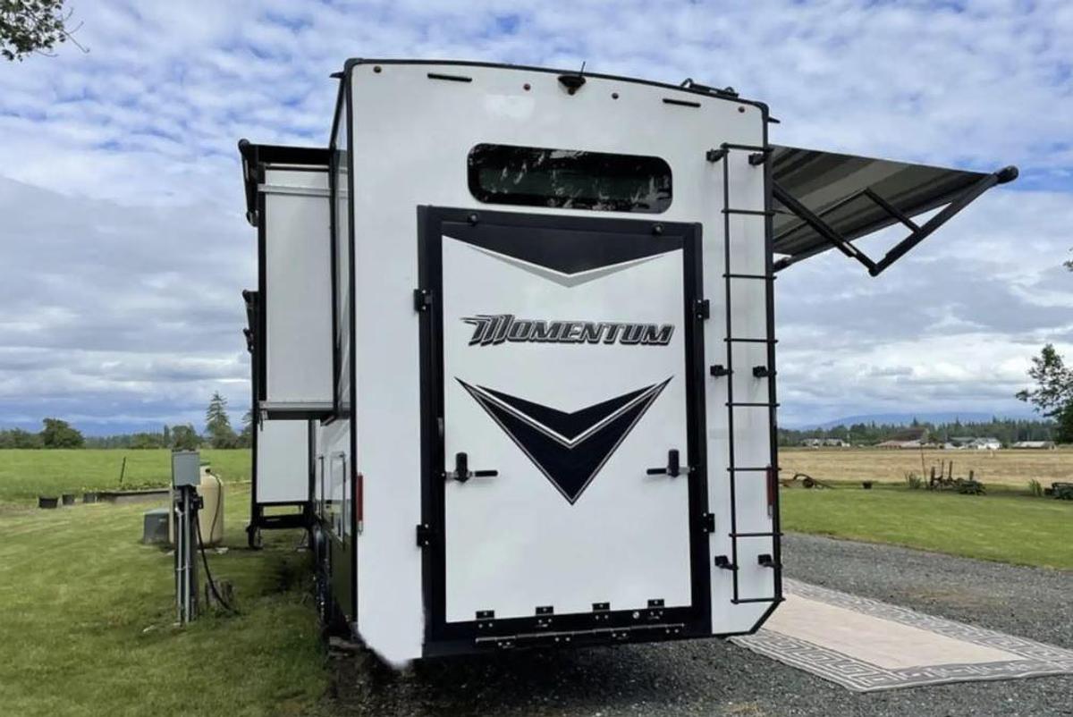 Used 2021 Grand Design MOMENTUM 376THS Fifth Wheel