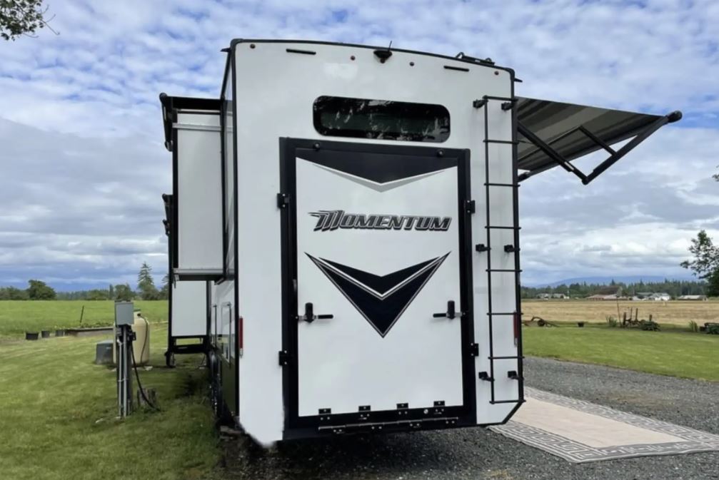 Used 2021 Grand Design MOMENTUM 376THS Fifth Wheel
