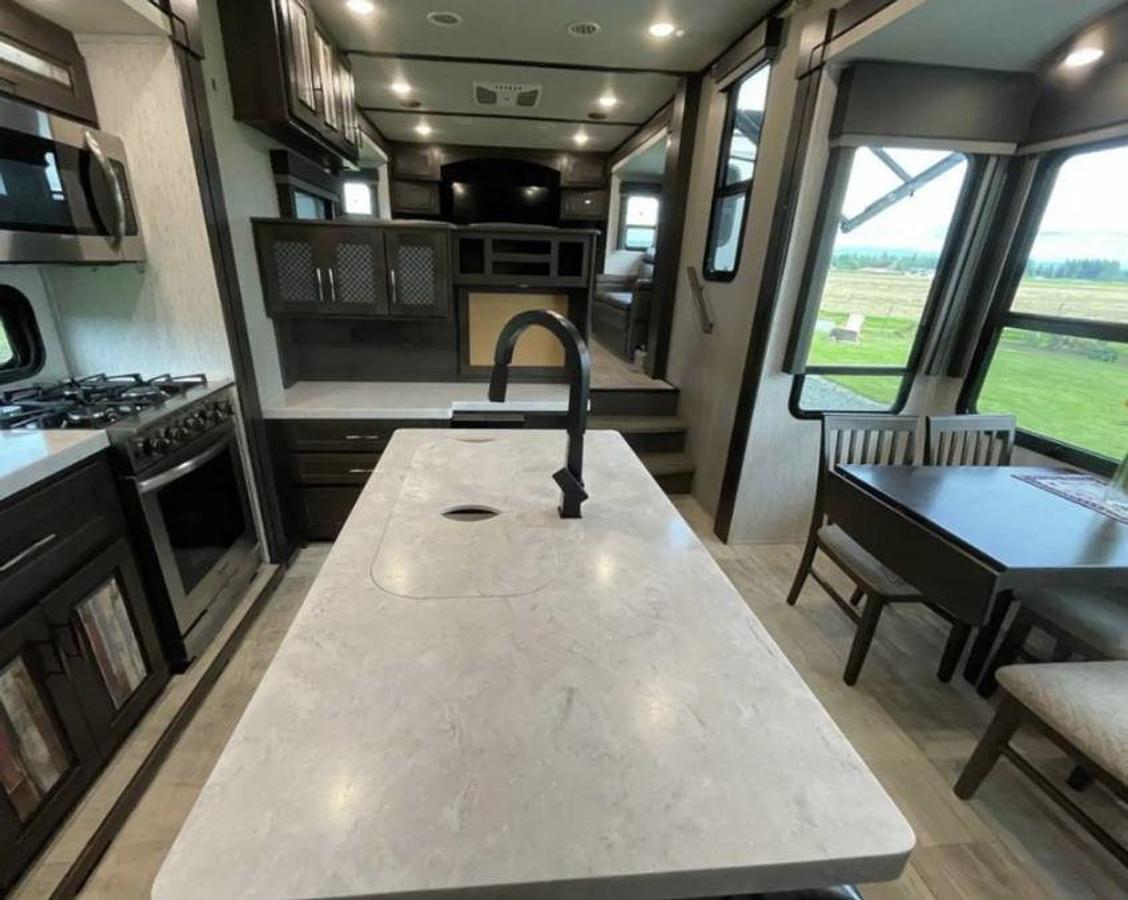 Used 2021 Grand Design MOMENTUM 376THS Fifth Wheel