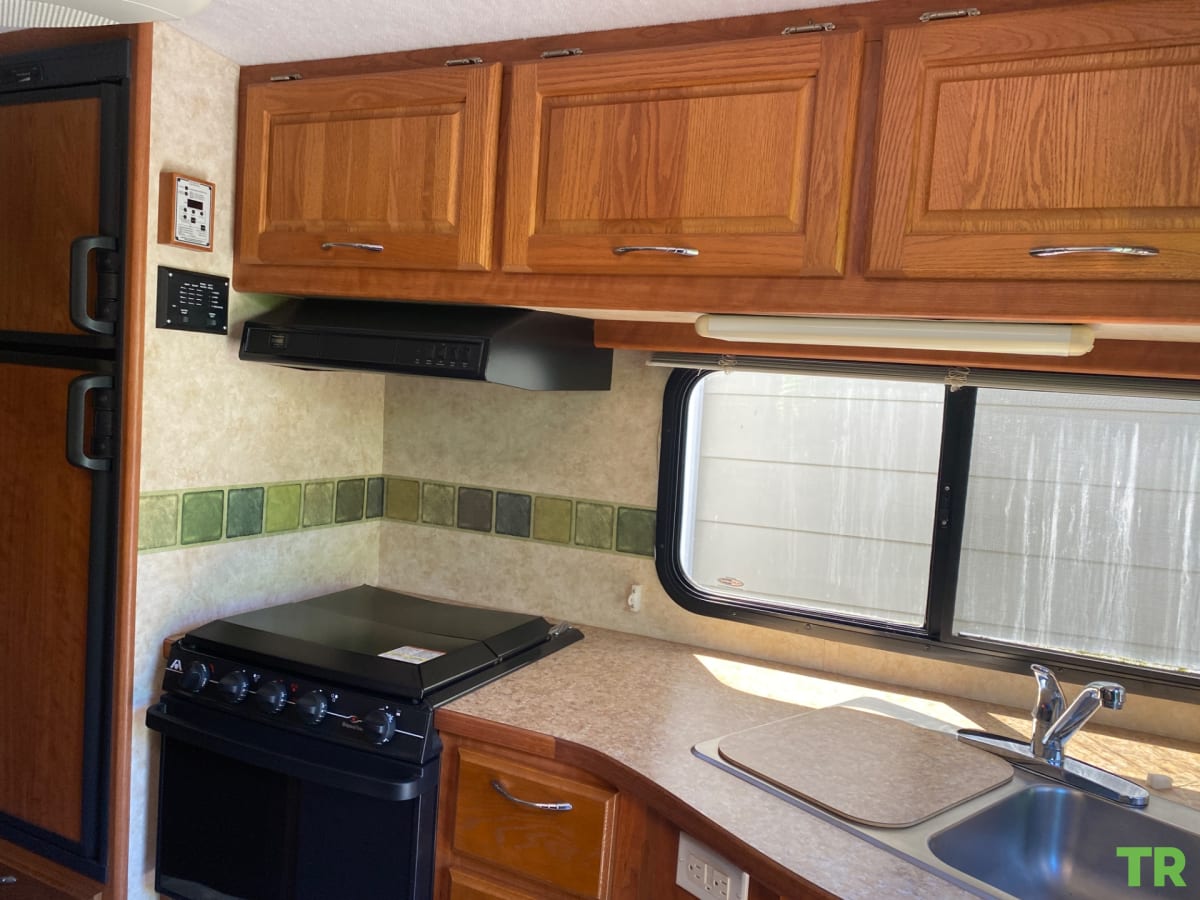 Used 2007 Bigfoot 24C10.4 Truck Camper | Four-Season | Solar Equipped | Generator | Dry Bath