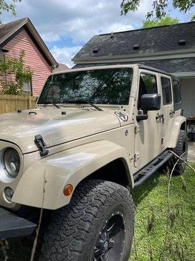 Used 2016 JEEP Wrangler Unlimited Sahara