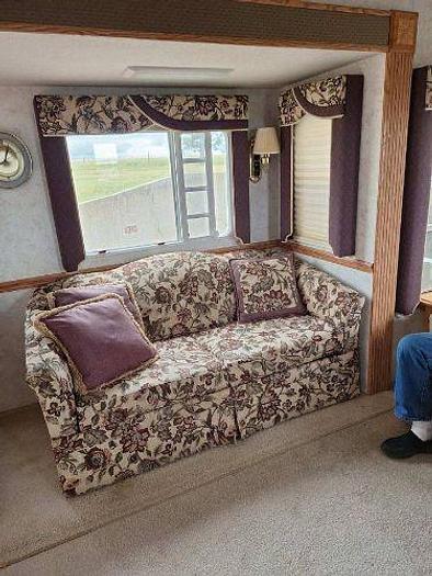 Used 2012 RAM 2500 and 2003 NuWa Hitchhiker Discover America