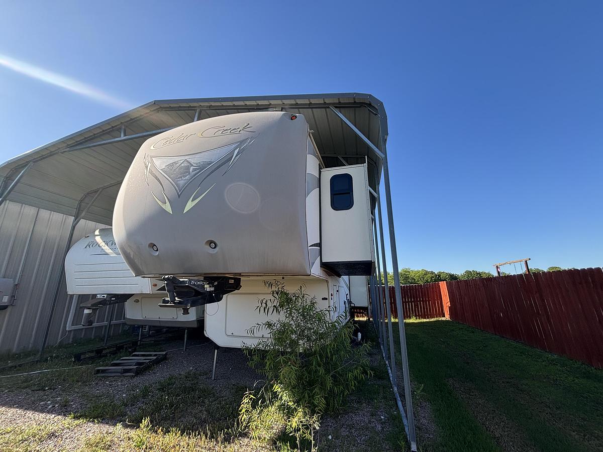Used  2014 Forest River Cedar Creek Fifth Wheel