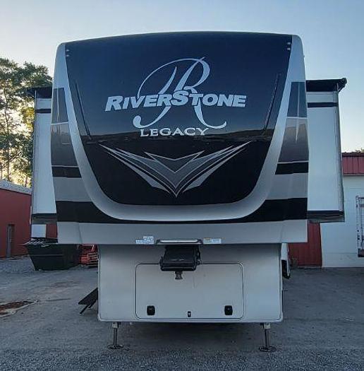 Used 2022 Forest River Riverstone Legacy Fifth Wheel Toy Hauler