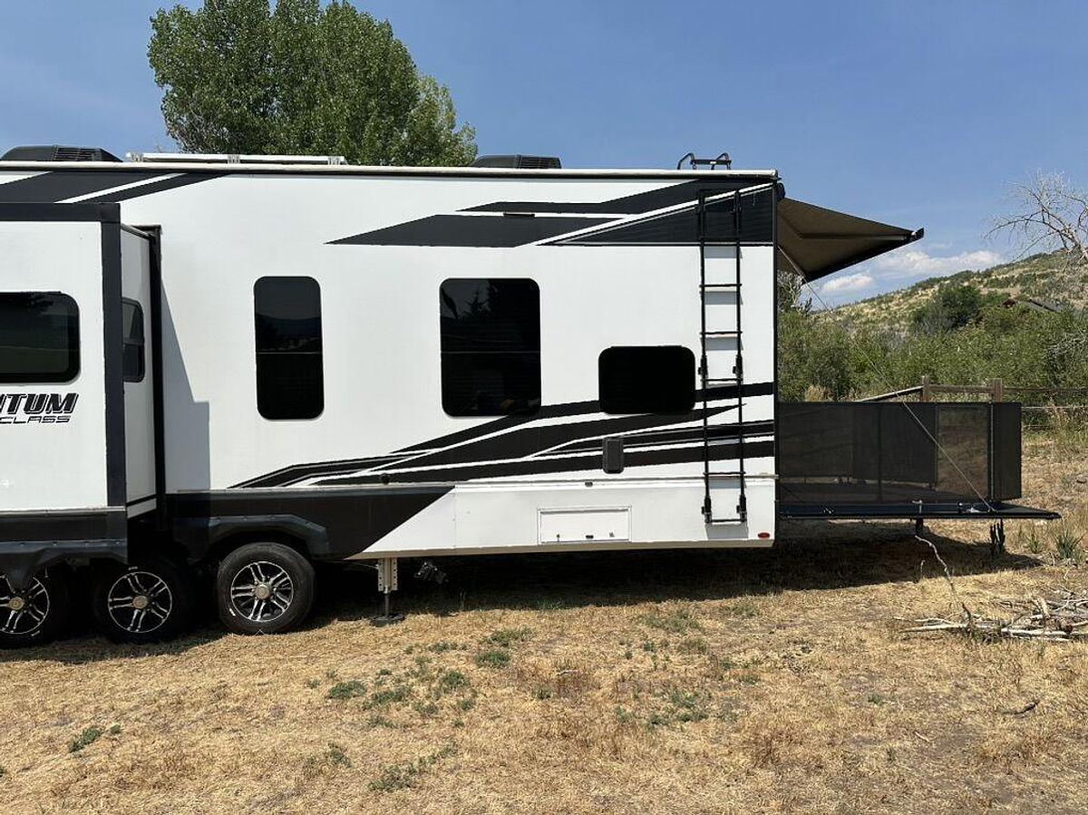 Used 2023 Grand Design Momentum M-395MS Fifth Wheel Toy Hauler