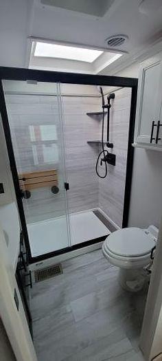 Used 2022 Forest River Riverstone Legacy Fifth Wheel Toy Hauler