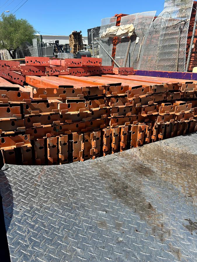 Used 12FT BY 5IN RIDG-U-RAK STYLE BEAMS