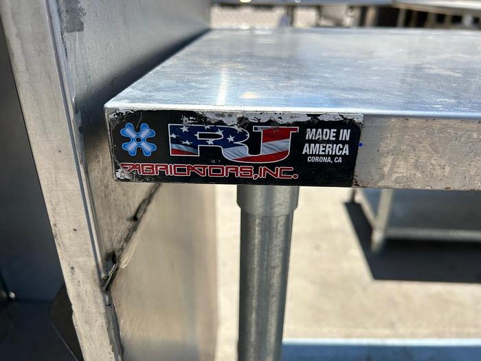 Used 8 FT STAINLESS STEEL WORK TABLE WITH UNDERSHELF./