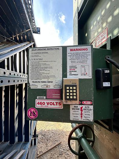 Used PHILADELPHIA TRAMRAIL CO. DOWNSTROKE VERITICAL BALER; 10HP