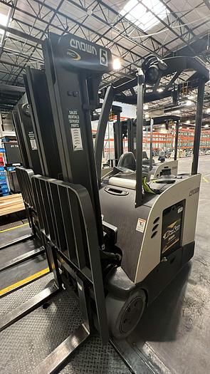 Used CROWN ACCESSES-123 STAND-UP FORKLIFT