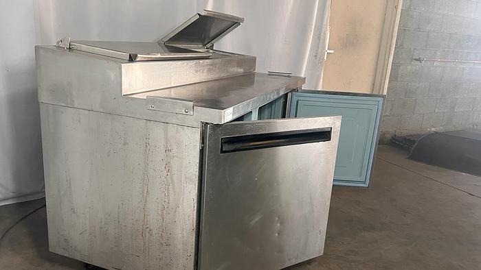 Used REFRIGERATED SANDWICH PREP TABLE (NEEDS SPECS FRO THE TAG)./