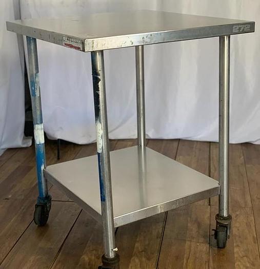 Used STAINLESS STEEL TABLE WITH CASTERS !