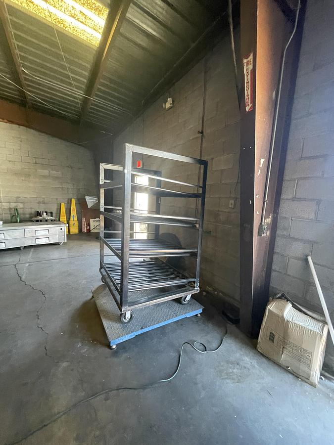 Used INDUSTRIAL BATTERY STORAGE RACK