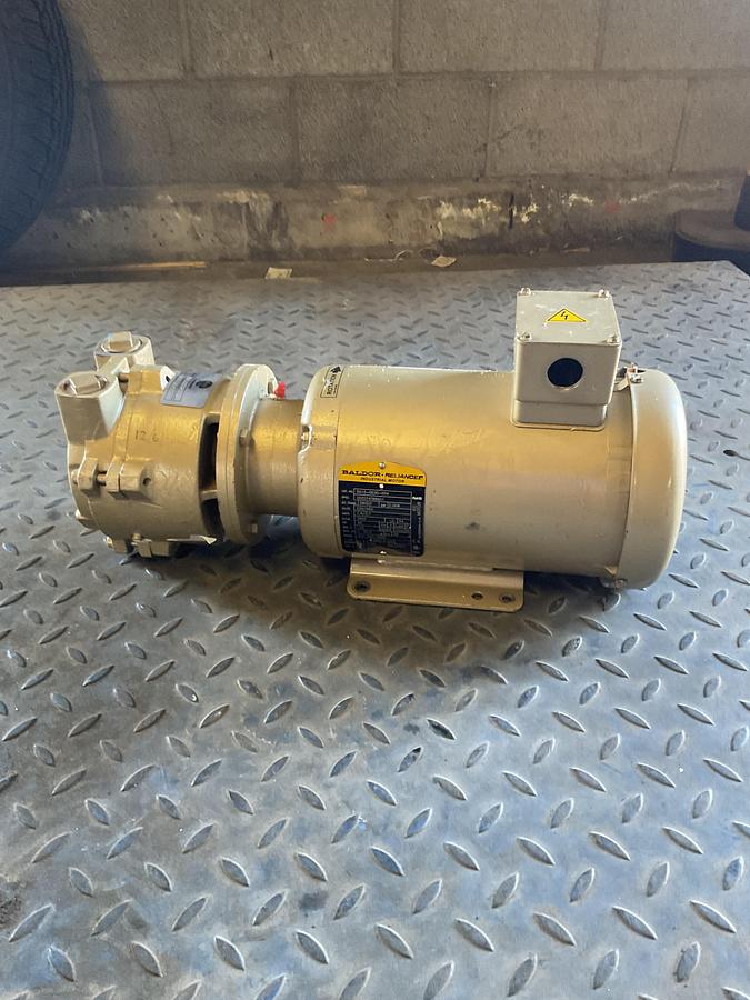 Used BALDOR • RELIANCE INDUSTRIAL MOTOR + EVAC PUMP ASSEMBLY