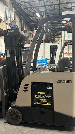 Used CROWN ACCESSES-123 STAND-UP FORKLIFT