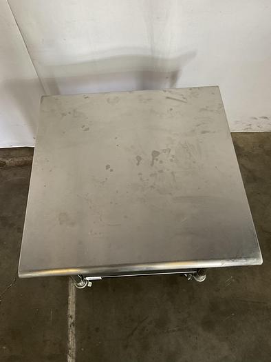 Used STAINLESS STEEL ULINE ROLLING EQUIPMENT TABLE